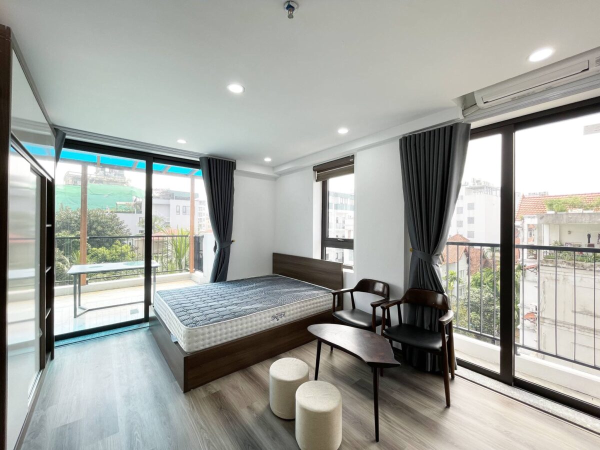 Bright big-balcony 1BR apartment for rent in To Ngoc Van Street (1)