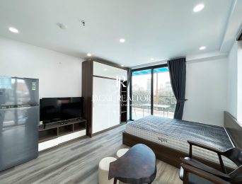 Bright big-balcony 1BR apartment for rent in To Ngoc Van Street (2)